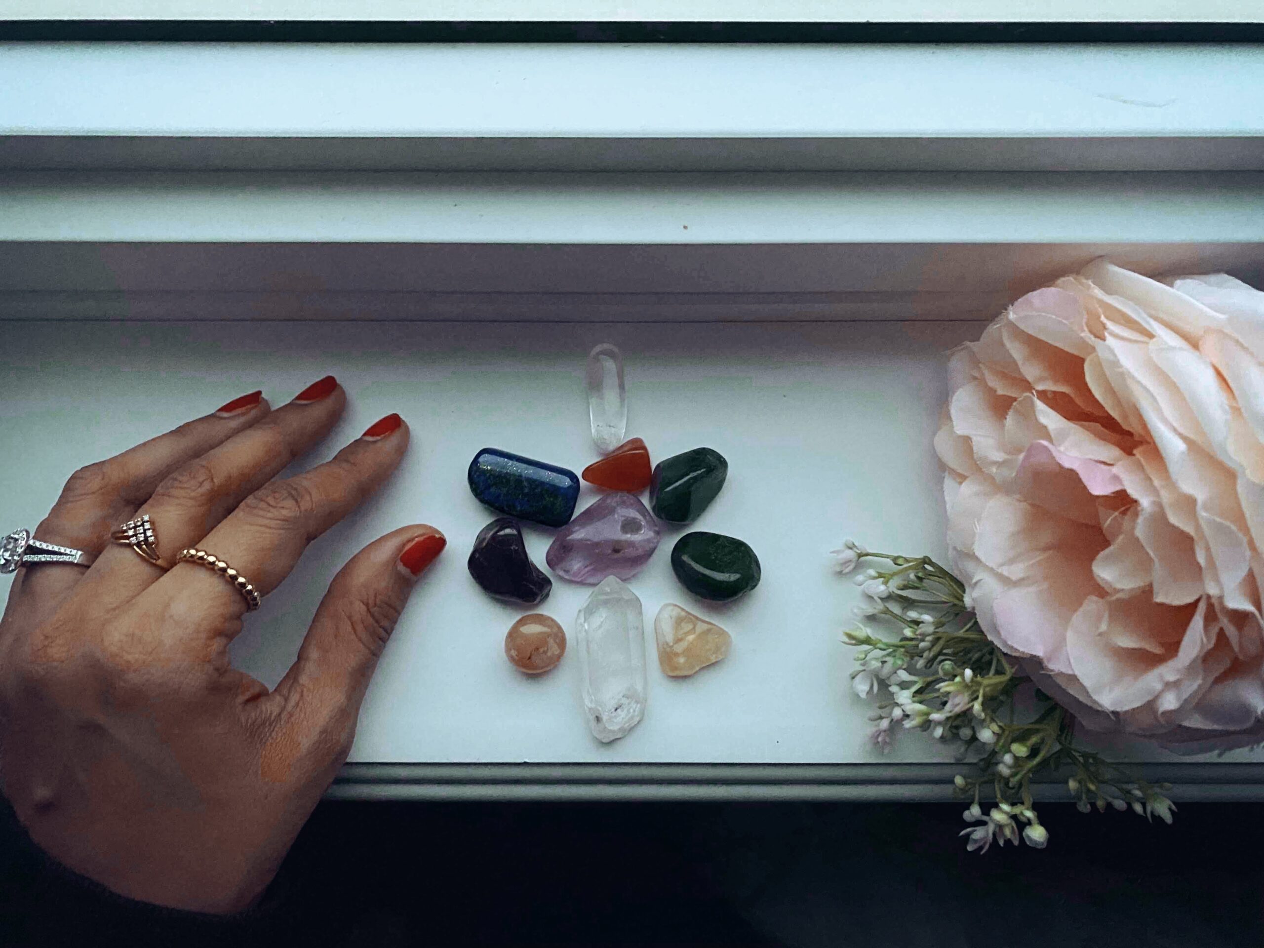 Crystals, Higher Self, Spirituality, Soul Care,  Self care, Window Sill, Energy, Full Moon, Flowers, Rings, Brown Hands, Red Nail Polish
